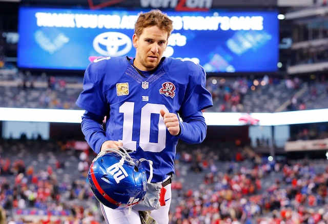 Eli Manning walking with helmet off.jpg